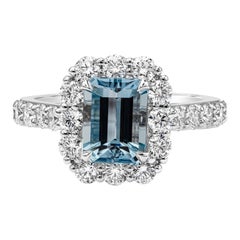 1.58 Carat Emerald Cut Aquamarine and Diamond Halo Engagement Ring