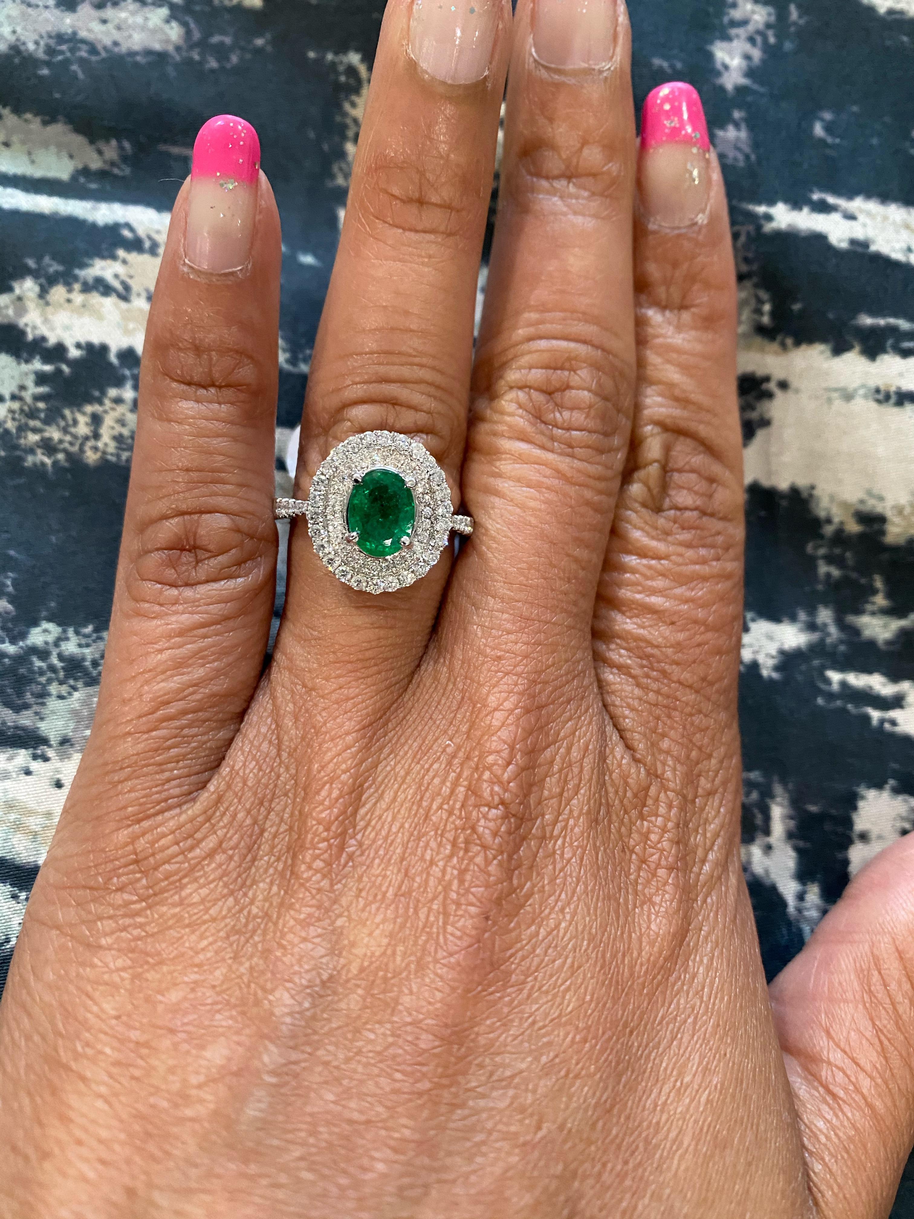 Modern Double Halo 1.58 Carat Emerald and Diamond 18 Karat White Gold Engagement Ring