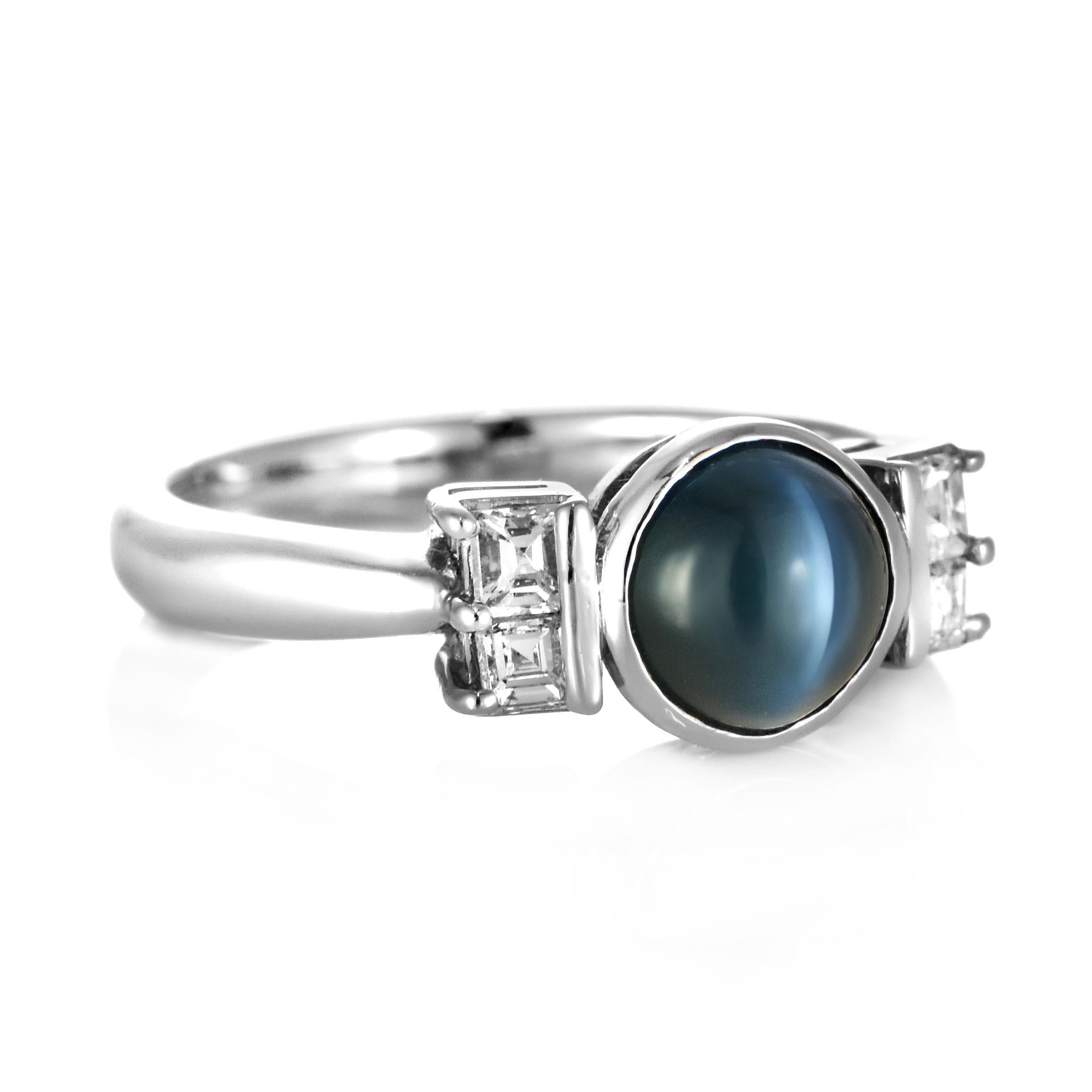 A gorgeous ring featuring 1.584 Carats, Natural Alexandrite Cat's Eye and 0.26 Carats of Diamond Accents set in Platinum. Alexandrites produce a natural color-change phenomenon as they exhibit a Bluish Green Color under Fluorescent Light whereas a