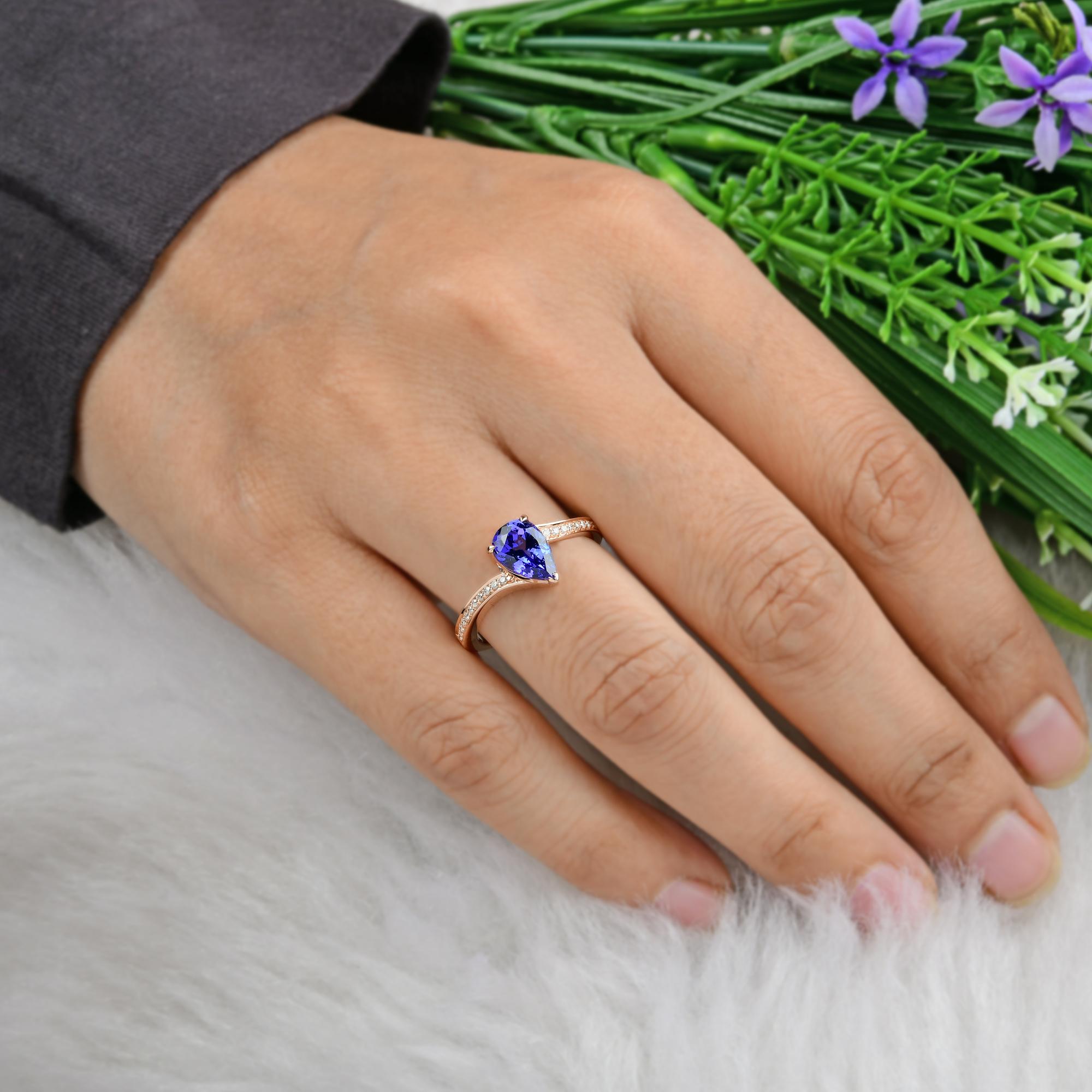 1.58 Carat Pear Shape Tanzanite Ring 0.10 Ct Pave Diamond 18 Karat Rose Gold For Sale 1