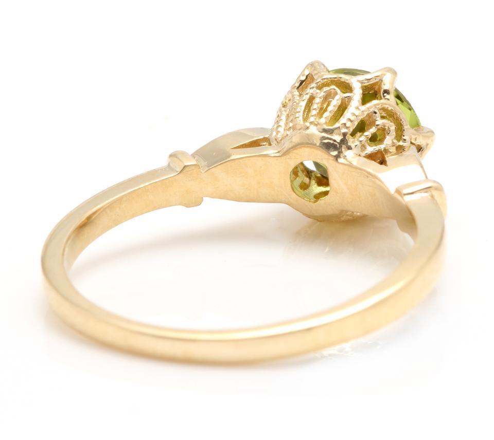 1.58 Carat Impressive Natural Peridot and Diamond 14 Karat Yellow Gold Ring In New Condition For Sale In Los Angeles, CA