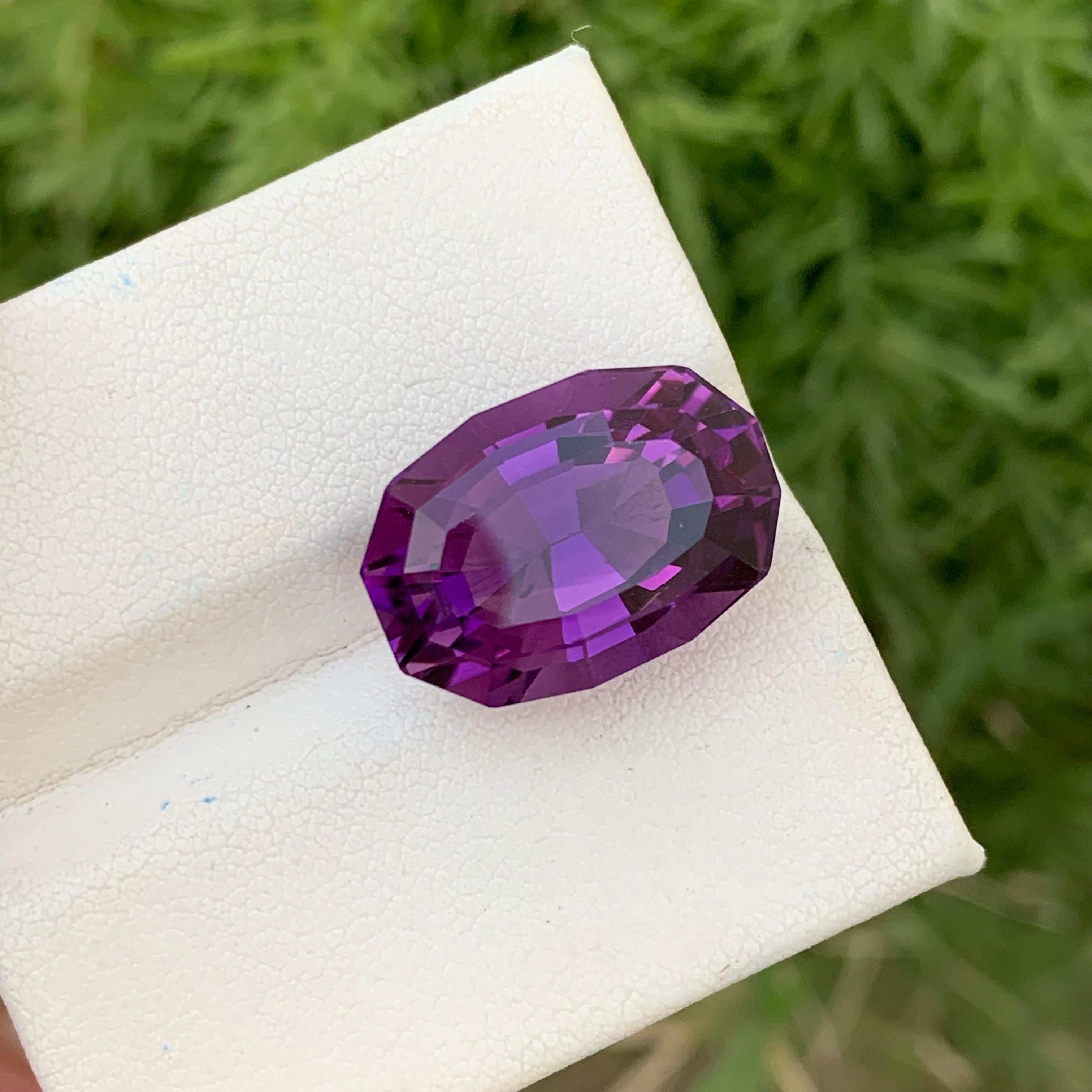 Loose Amethyst 
Weight: 15.80 Carats 
Dimension: 18.5x12.9x11.1 Mm
Origin: Brazil Mine
Shape: Dodecagon
Treatment: Nill
Certificate; On Demand 
Purple amethyst, a member of the quartz family, is a captivating gemstone admired for its rich violet