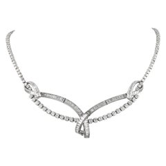 Collana di diamanti tondi e baguette da 15,80 carati in platino