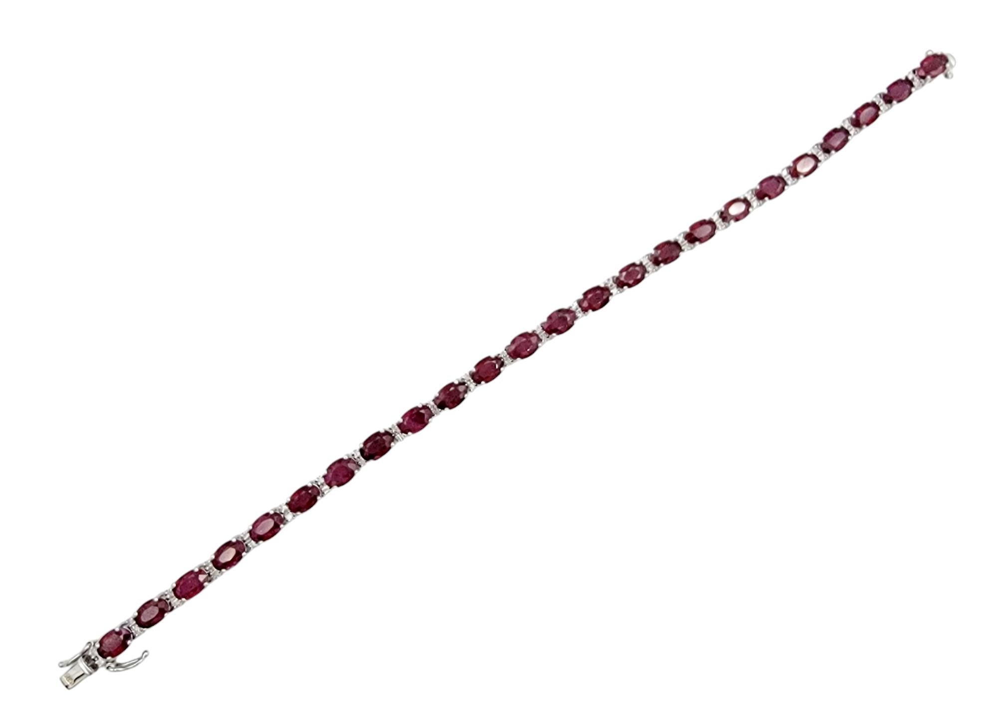 Contemporary 15.81 Carat Total Oval Ruby and Diamond Tennis Bracelet in 14 Karat White Gold For Sale