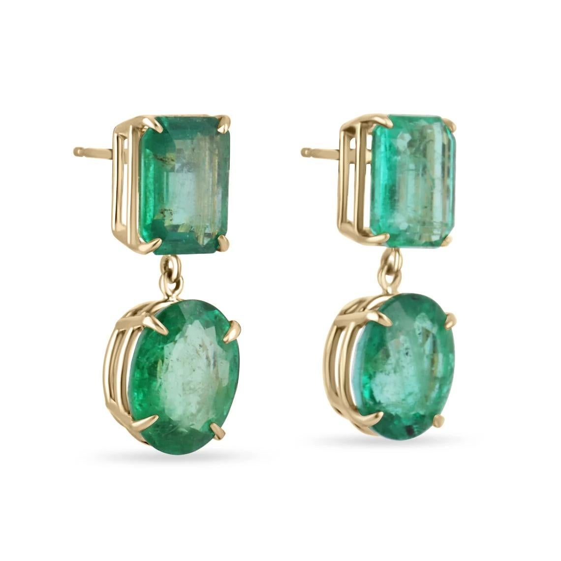 JAW-DROPPING! Large natural Emerald dangling studs dexterously handcrafted in fine solid 18K yellow gold. Displayed are fine, ONE OF A KIND set of rare emerald and oval-cut, emeralds with very good transparency, accented by a simple four-prong gold