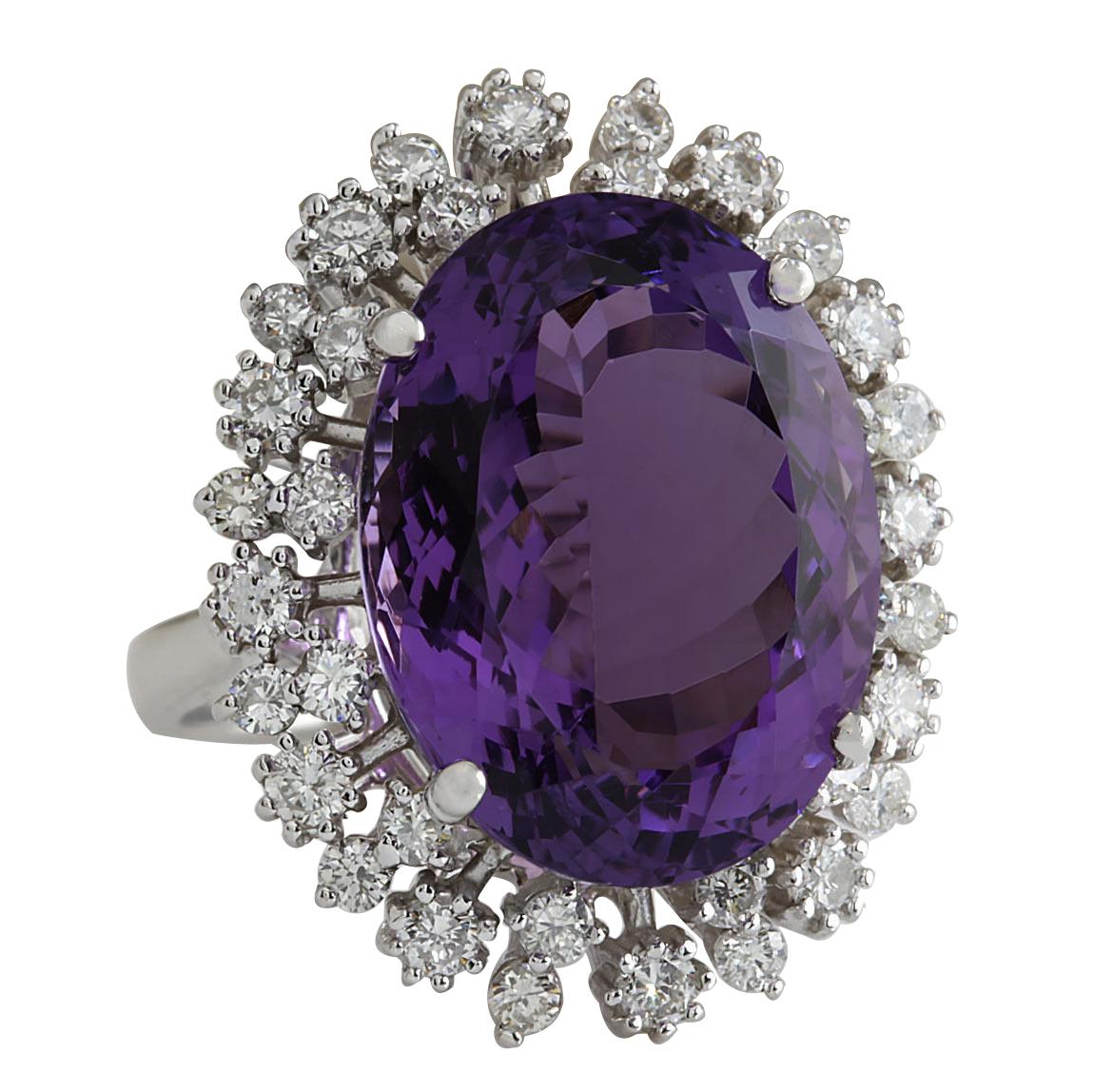 15.83 Carat Natural Amethyst 14 Karat White Gold Diamond Ring
Stamped: 14K White Gold
Total Ring Weight: 7.0 Grams
Total Natural Amethyst Weight is 14.58 Carat (Measures: 18.00x13.00 mm)
Color: Purple
Total Natural Diamond Weight is 1.25