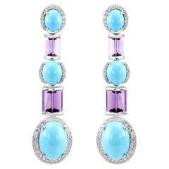 Turchese americano cabochon da 15,83 carati, ametista da 4,86 carati e orecchini in oro 18 carati con diamanti