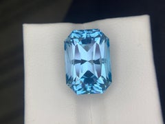 15.85 Carats Natural Faceted Blue Topaz Emerald Cut