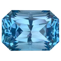 15.85 Carats Natural Faceted Blue Topaz Emerald Cut