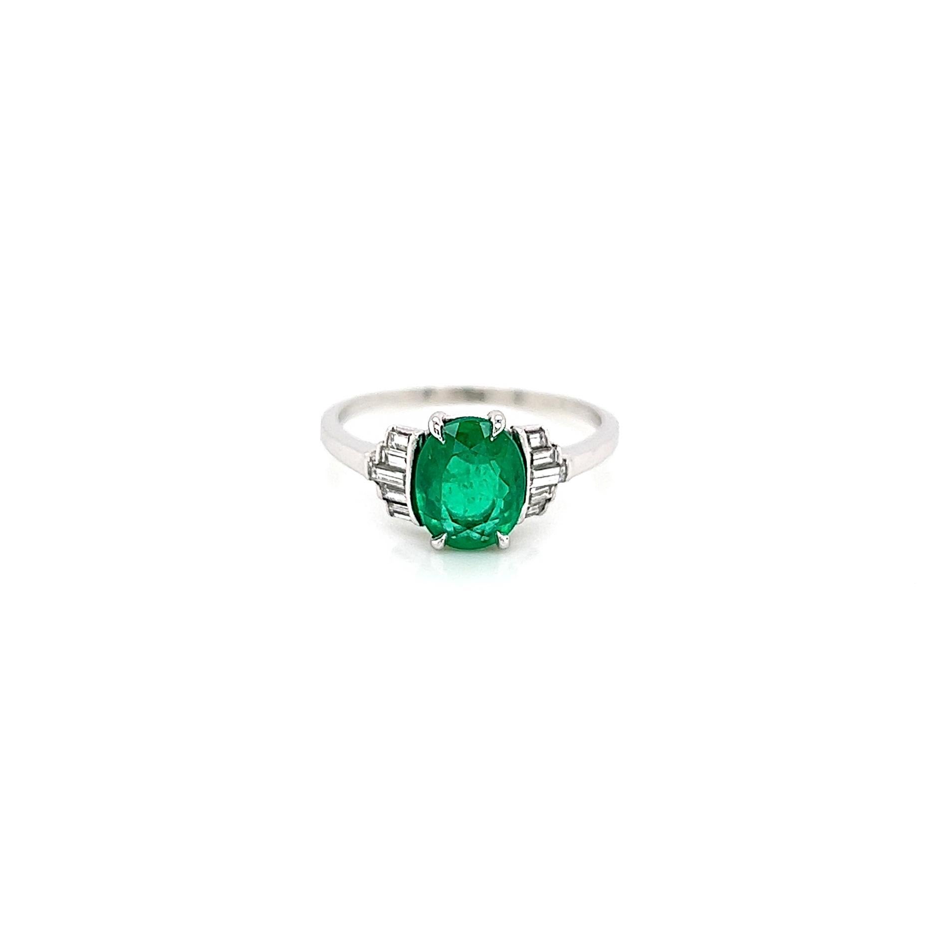 1.58 Total Carat Natural Columbian Green Emerald and Diamond Ladies Vintage Ring

-Metal Type: Platinum
-Oval Columbian Green Emerald
-Baguette Natural Diamonds
-Size 7.0

Made in New York City