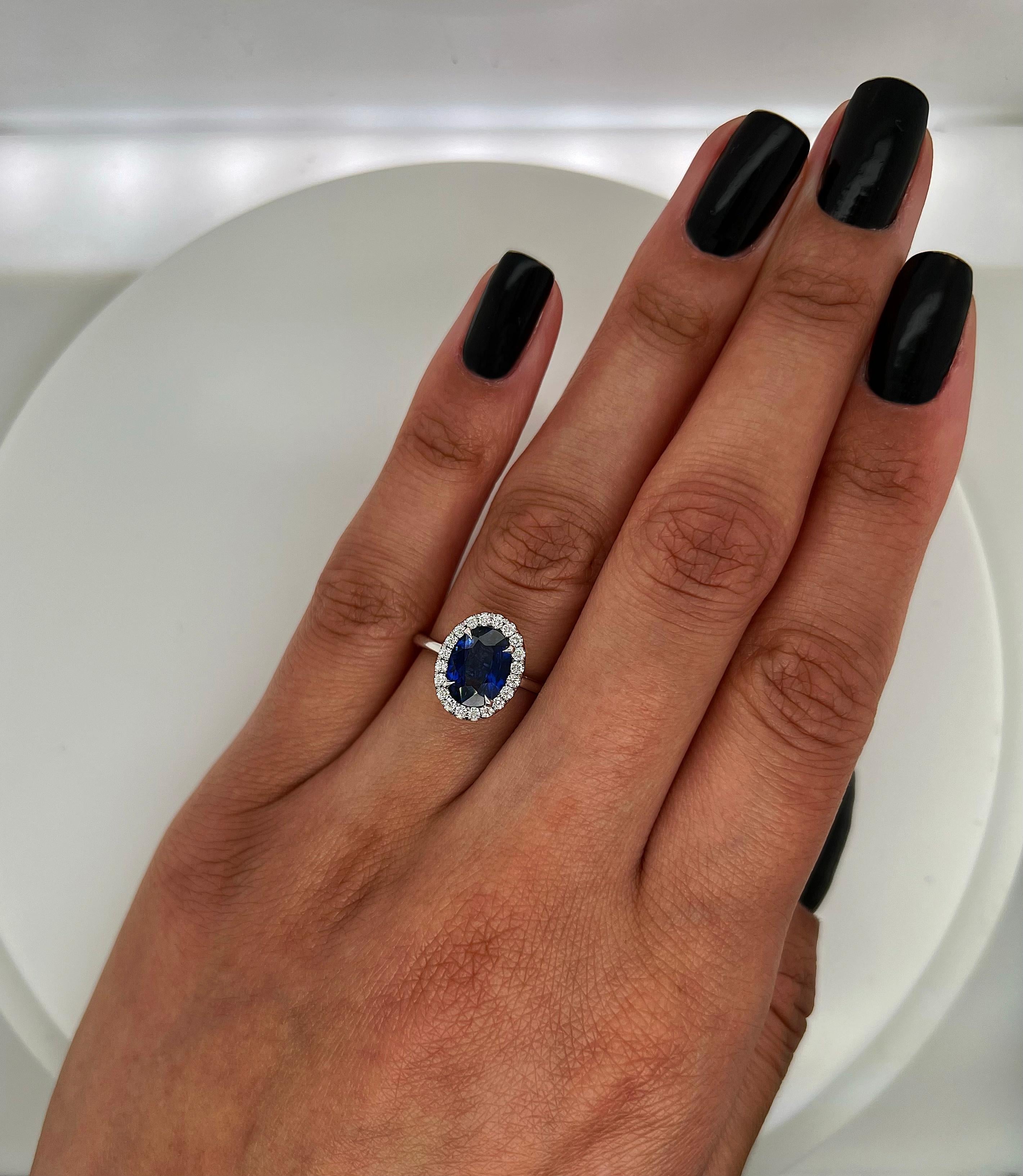 Oval Cut 1.88 Total Carat Sapphire Diamond Halo Ladies Ring For Sale