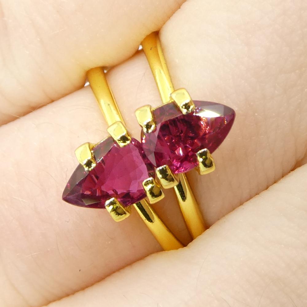 Description:

Gem Type: Ruby 
Number of Stones: 2
Weight: 1.58 cts
Measurements: 7.06 x 5.03 x 2.87 mm, 7.07 x 5.13 x 2.33 mm
Shape: Pear
Cutting Style Crown: Brilliant Cut
Cutting Style Pavilion: Step Cut 
Transparency: Transparent
Clarity: Very