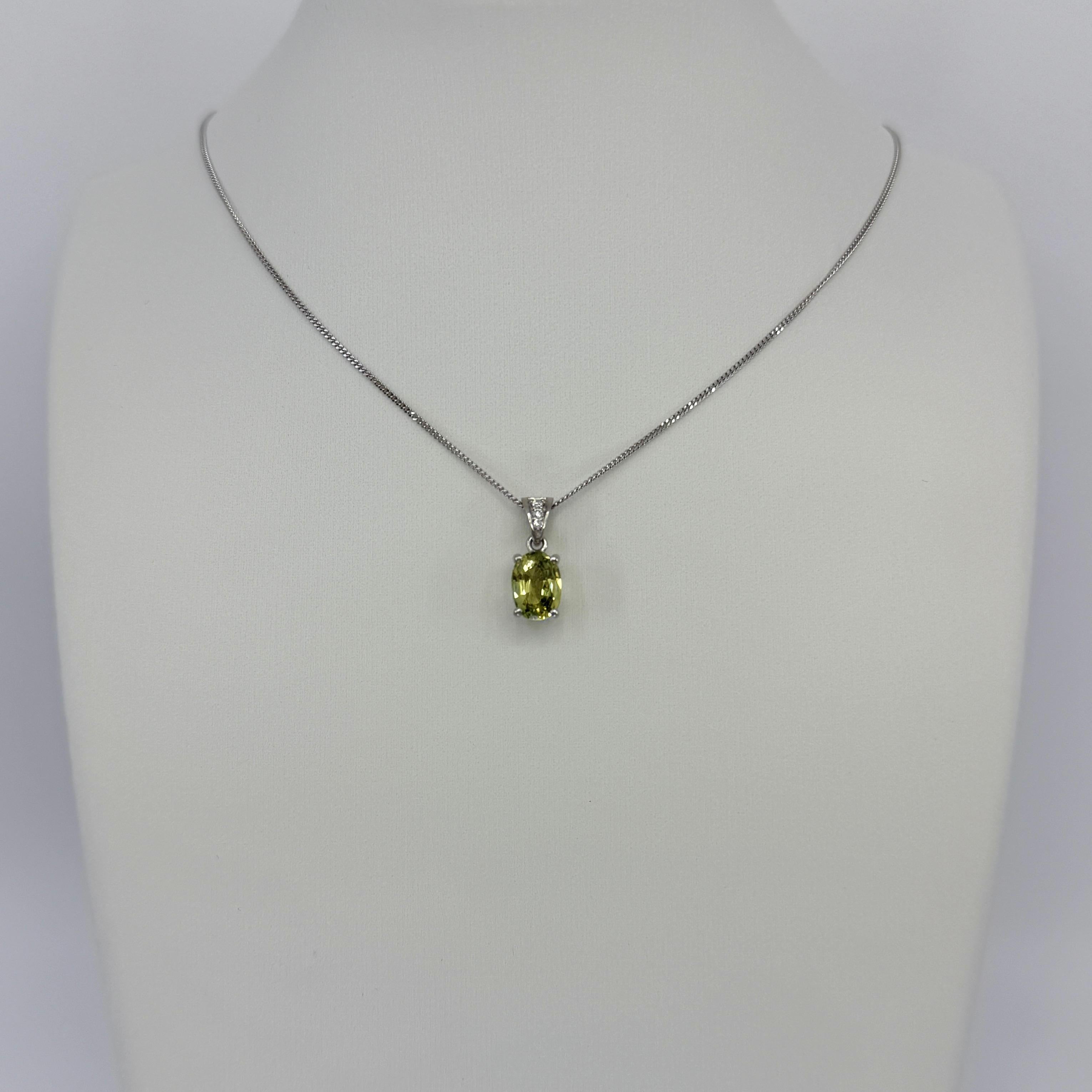 1.58ct Vivid Green Yellow Sapphire & Diamond Platinum Oval Cut Solitaire Pendant In New Condition For Sale In Birmingham, GB