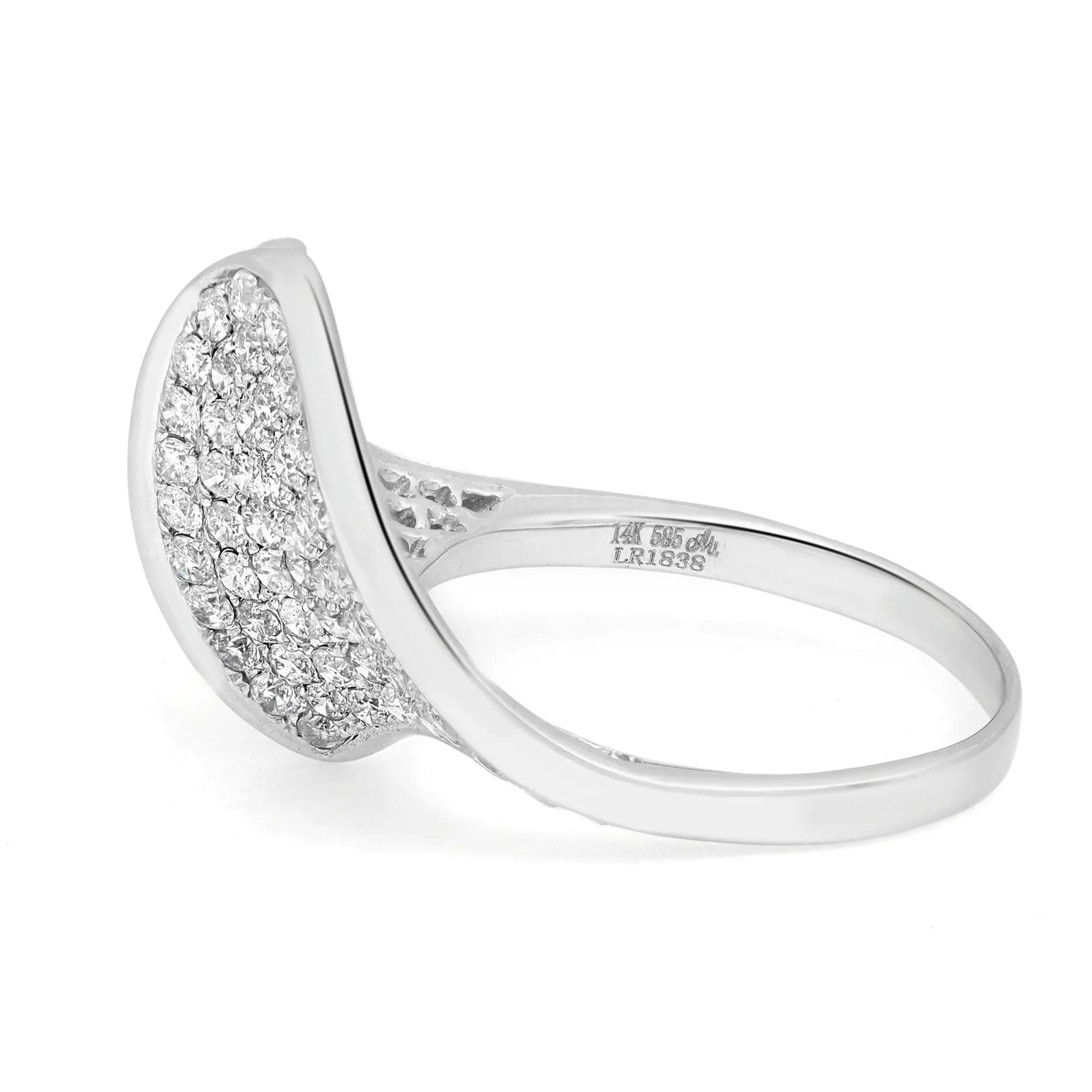 Bold and elegant diamond cocktail ring rendered in highly polished 14K white gold. This ring features sparkling round cut diamonds in pave setting totaling 1.58 carats. Diamond quality: H - I color and SI1 clarity. Ring size: 7.5. Total weight: 6.06