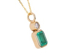 1.58tcw 14K Colombian Emerald-Emerald Cut & Diamond Pendant