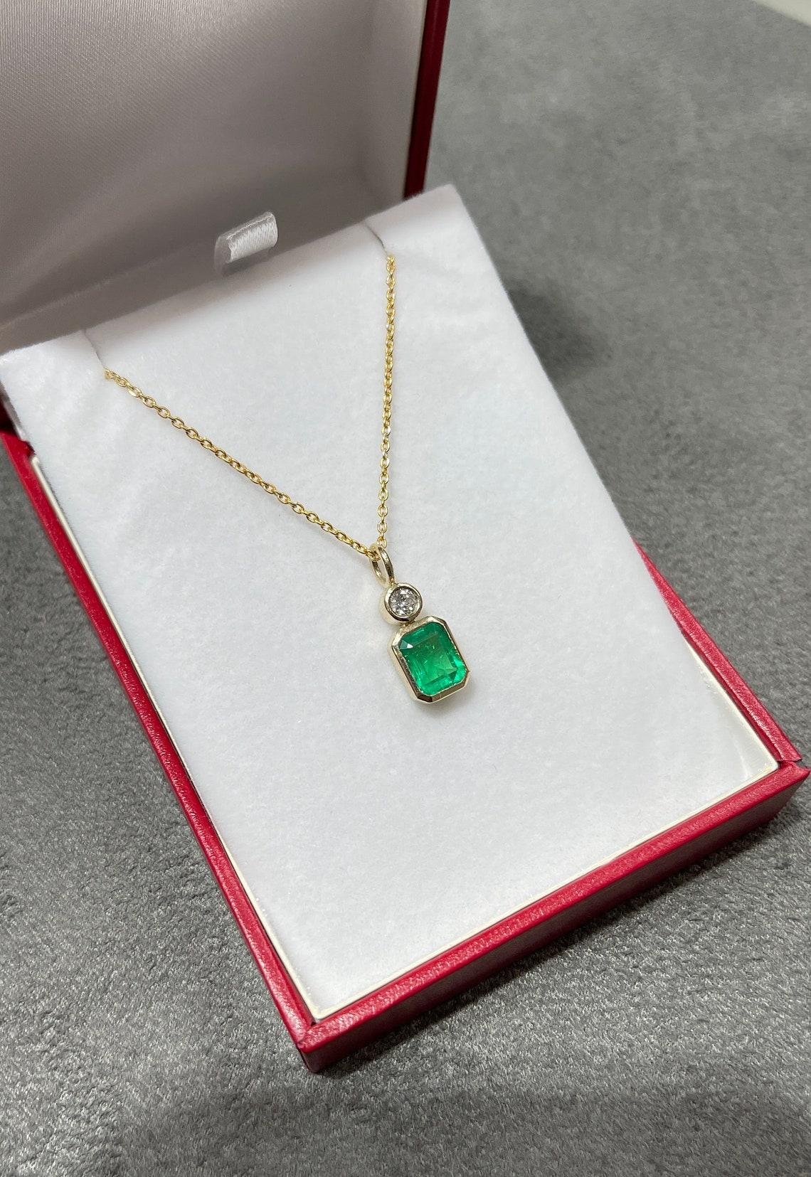 1.58tcw 14K Colombian Emerald-Emerald Cut & Diamond Pendant In New Condition For Sale In Jupiter, FL