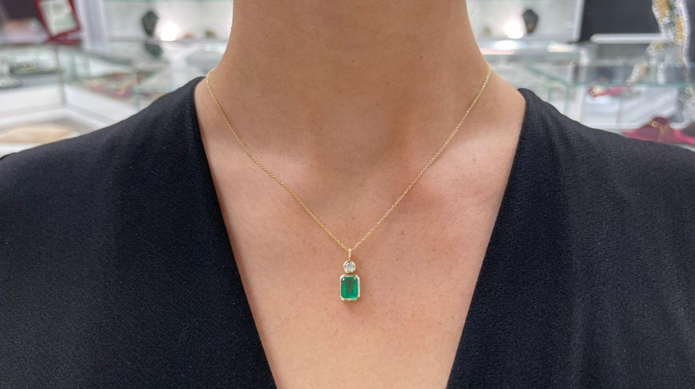 Women's 1.58tcw 14K Colombian Emerald-Emerald Cut & Diamond Pendant For Sale