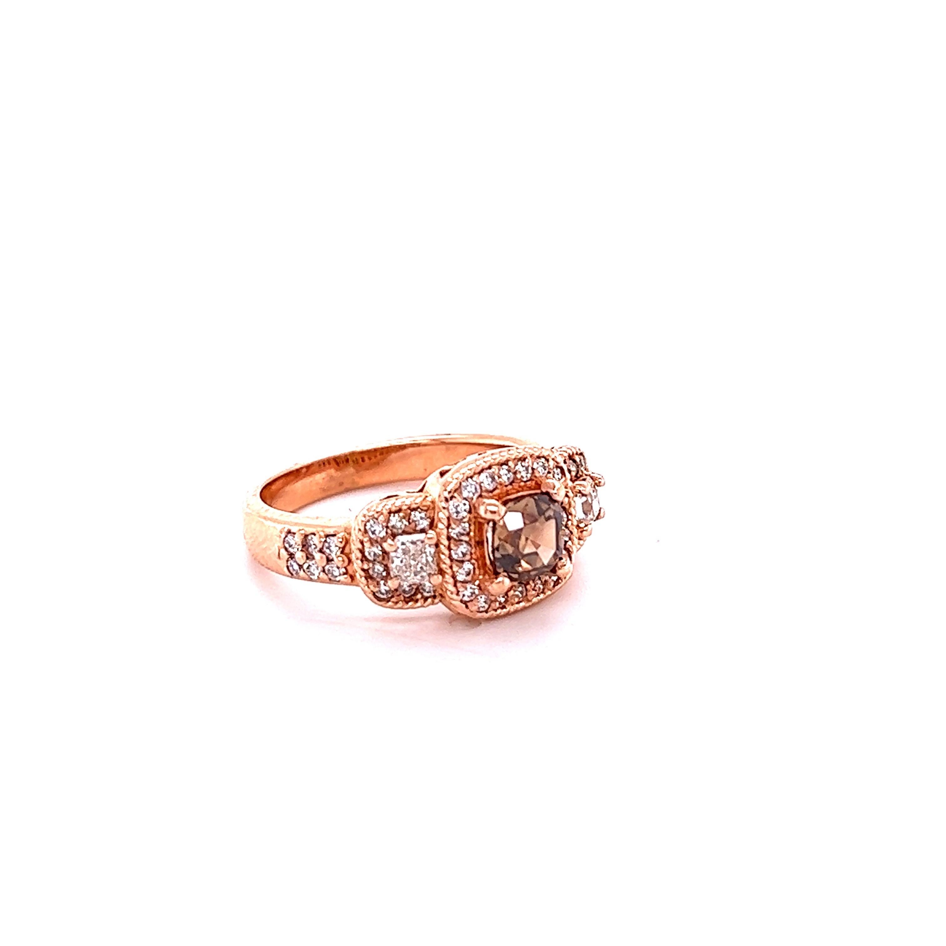 This Cushion Cut Natural Brown Diamond weighs 0.83 Carats and has 50 Natural White Diamonds on the sides that weigh 0.76 carats. The Clarity and Color of the Diamonds are VS-F. The total carat weight of the ring is 1.59 Carats. 

Crafted in 14 Karat