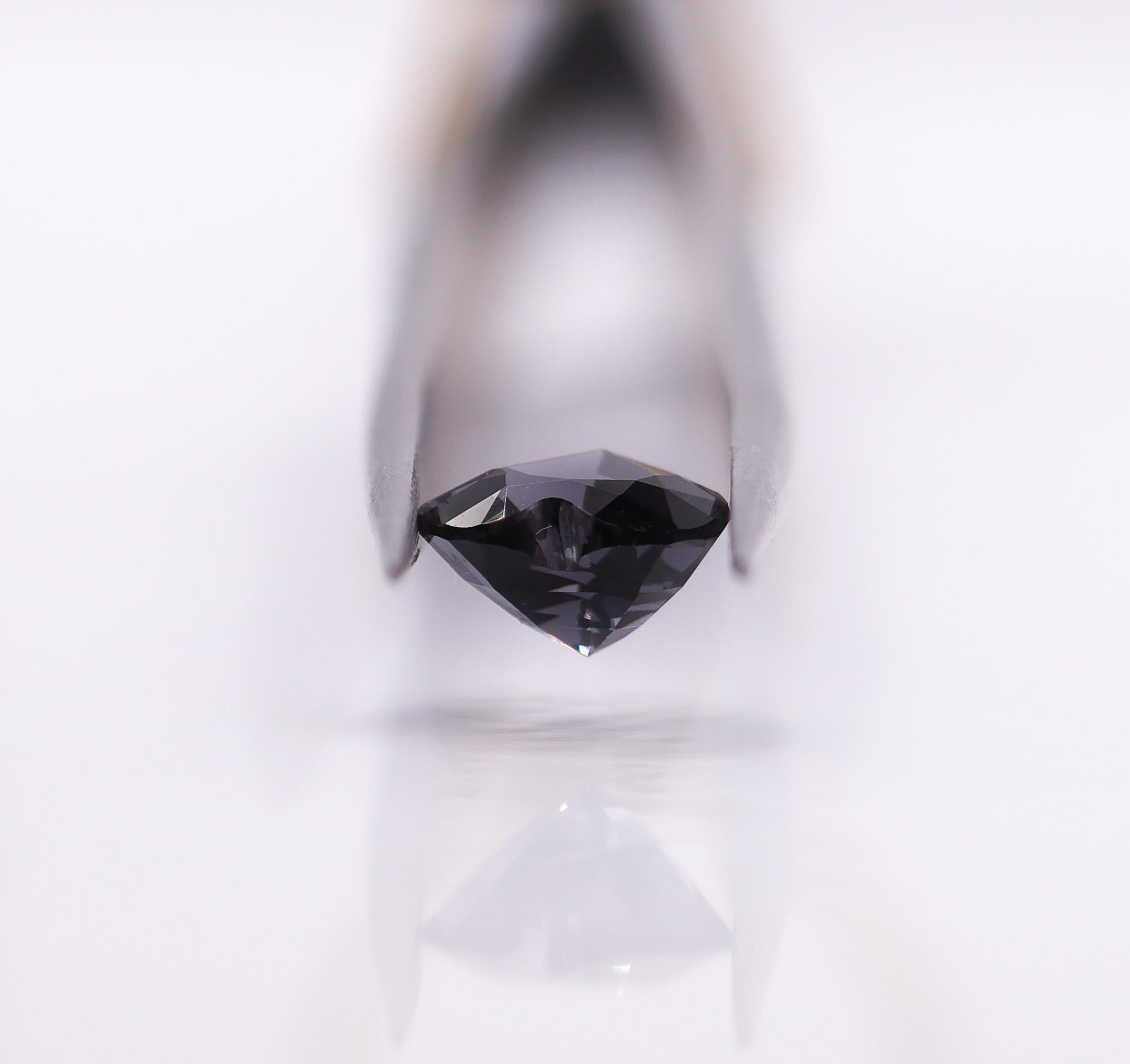 Presenting a 1.59 carat Grey Spinel gemstone! This gemstone's brilliance and clarity makes it a versatile choice for various jewelry designs, offering a modern and elegant twist to traditional gemstone options. 

Specifications

Stone: Grey