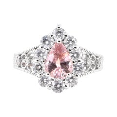 1.59 Carat Natural Padparadscha Sapphire and Diamond Ring Set in Platinum