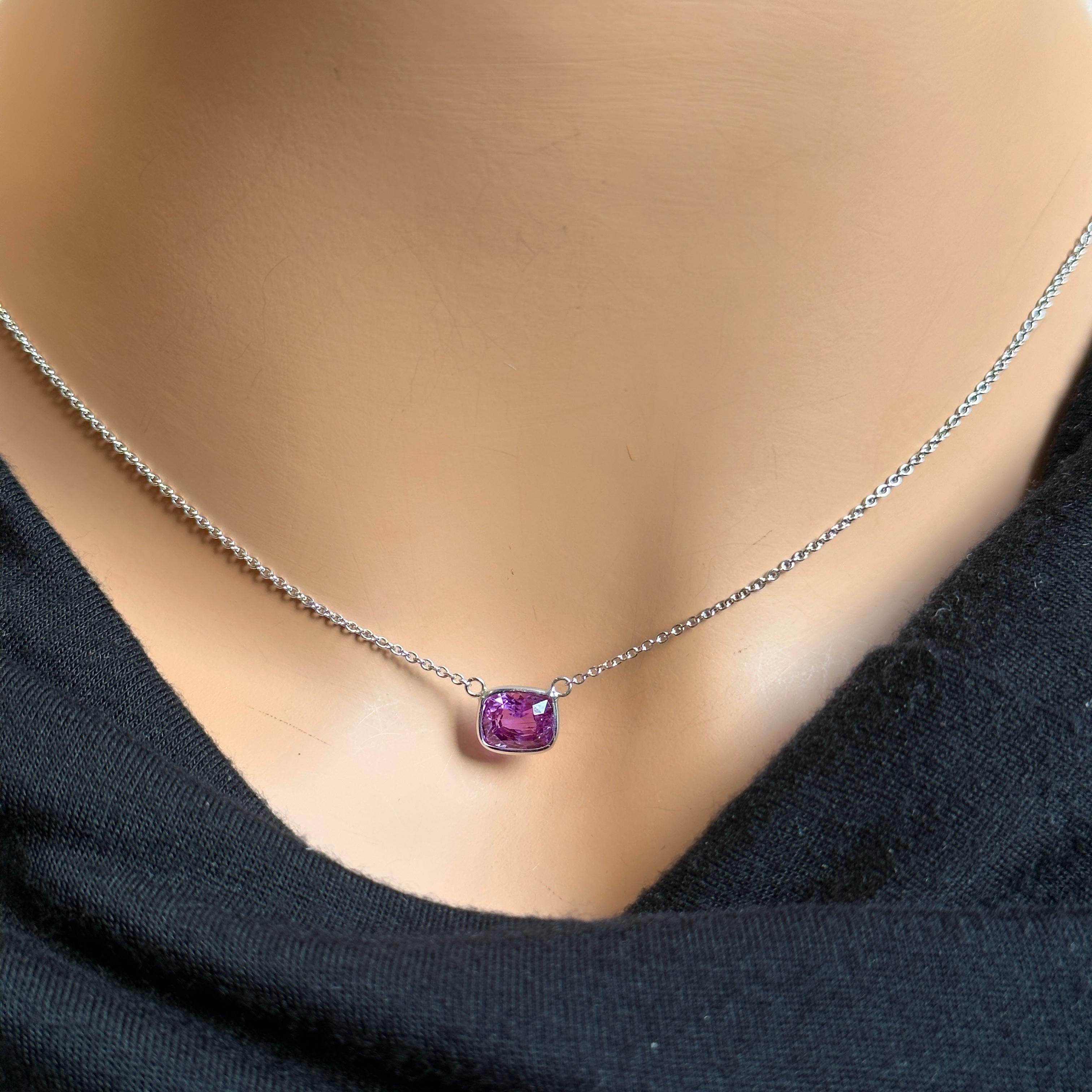 A fashion necklace made of 14k white gold with a main stone of a certified purple cushion-cut sapphire weighing 1.93 carats would be a stunning and luxurious choice. Purple sapphires are known for their rich and regal color, and the cushion cut adds