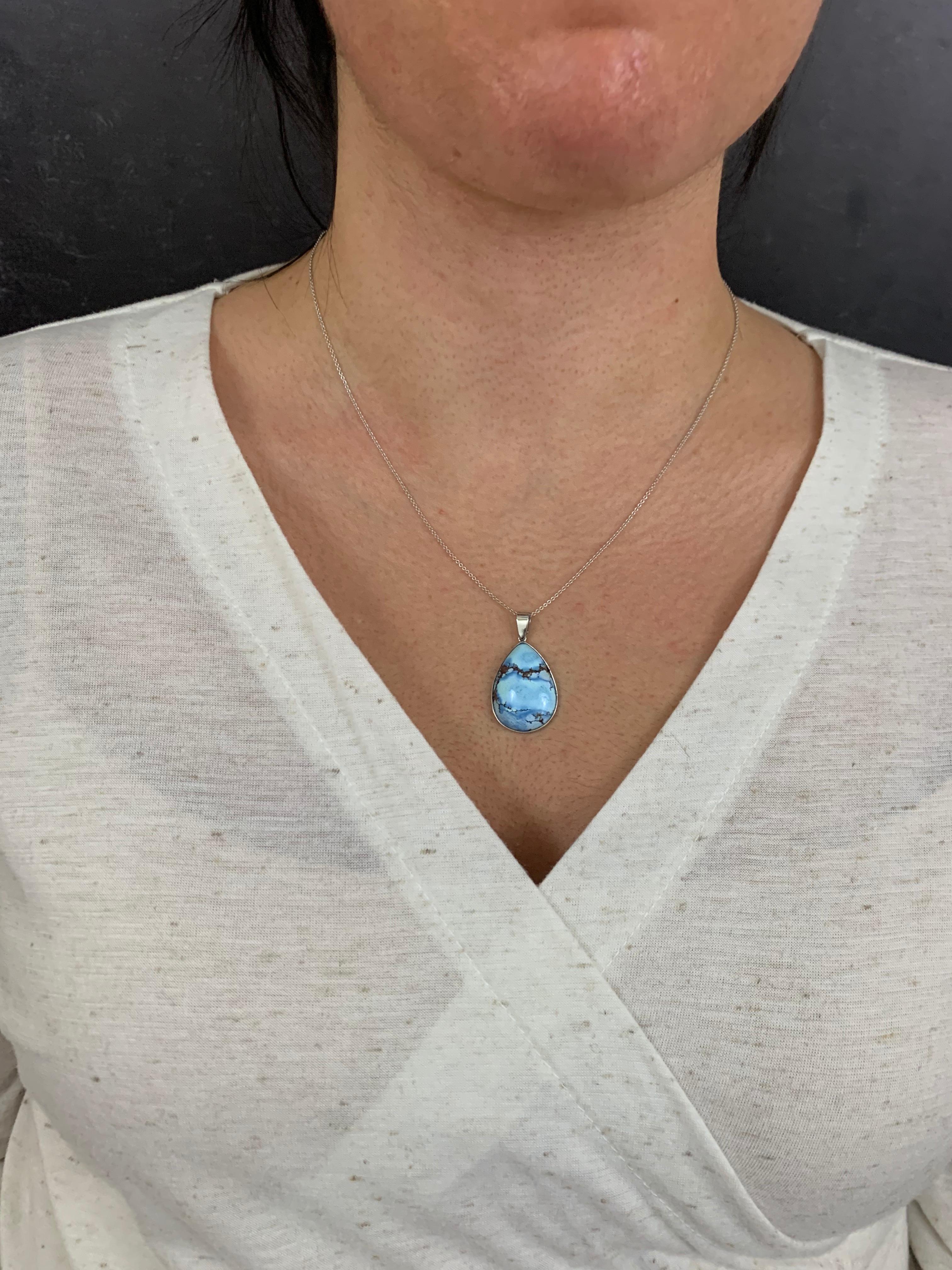 14K White Gold
1 Pear Shaped Turquoise at 15.92 Carats - Measuring 18 x 26 mm

Fine one-of-a-kind craftsmanship meets incredible quality in this breathtaking piece of jewelry. 

All pieces are made in the U.S.A and come with a lifetime warranty!
