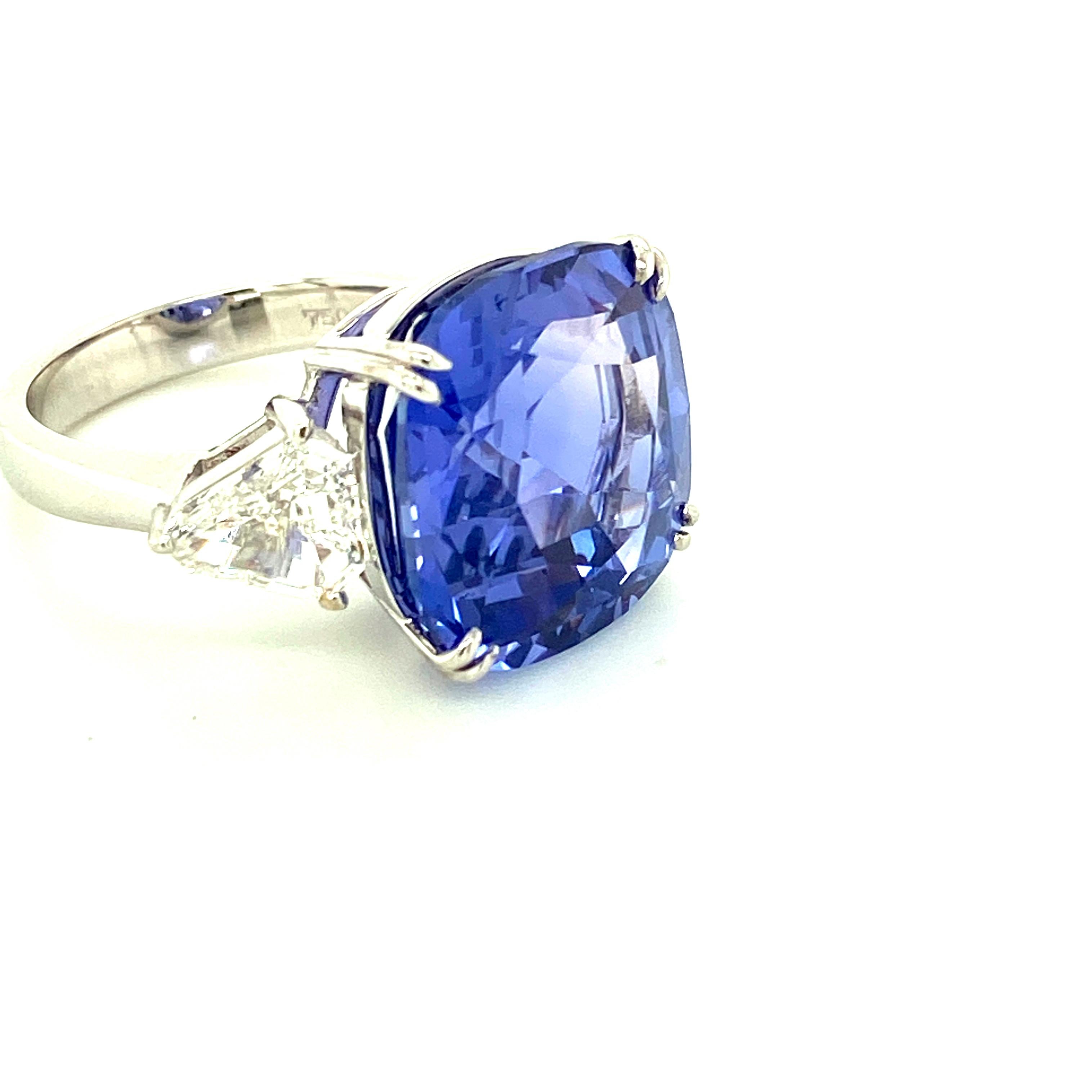 15.97 Carat GRS Certified No Heat Color Change Sapphire And Diamond Ring:

A magnificent ring, it features a huge 15.97 carat GRS certified unheated (no heat) color-change sapphire accented by two kite-cut white diamonds to form a beautiful