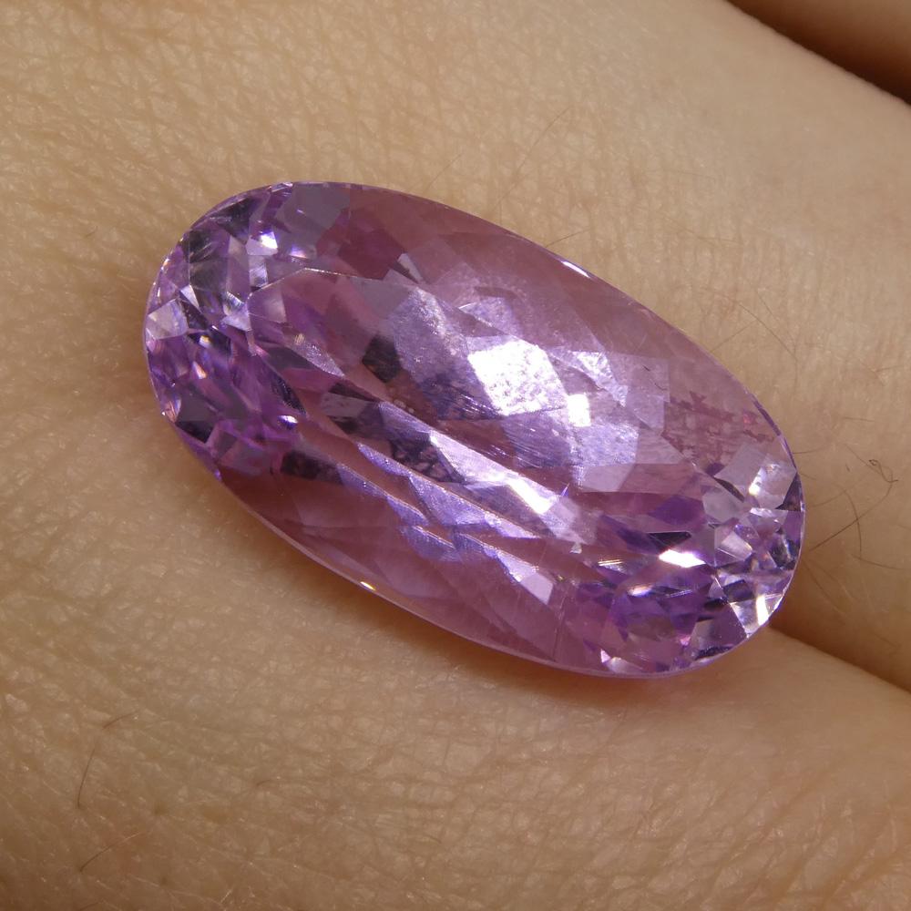 Description:

Gem Type: Kunzite
Number of Stones: 1
Weight: 15.98 cts
Measurements: 19.50x10.70x10.30mm
Shape: Oval
Cutting Style Crown: Modified Brilliant Cut
Cutting Style Pavilion: Mixed Cut
Transparency: Transparent
Clarity: Very Slightly