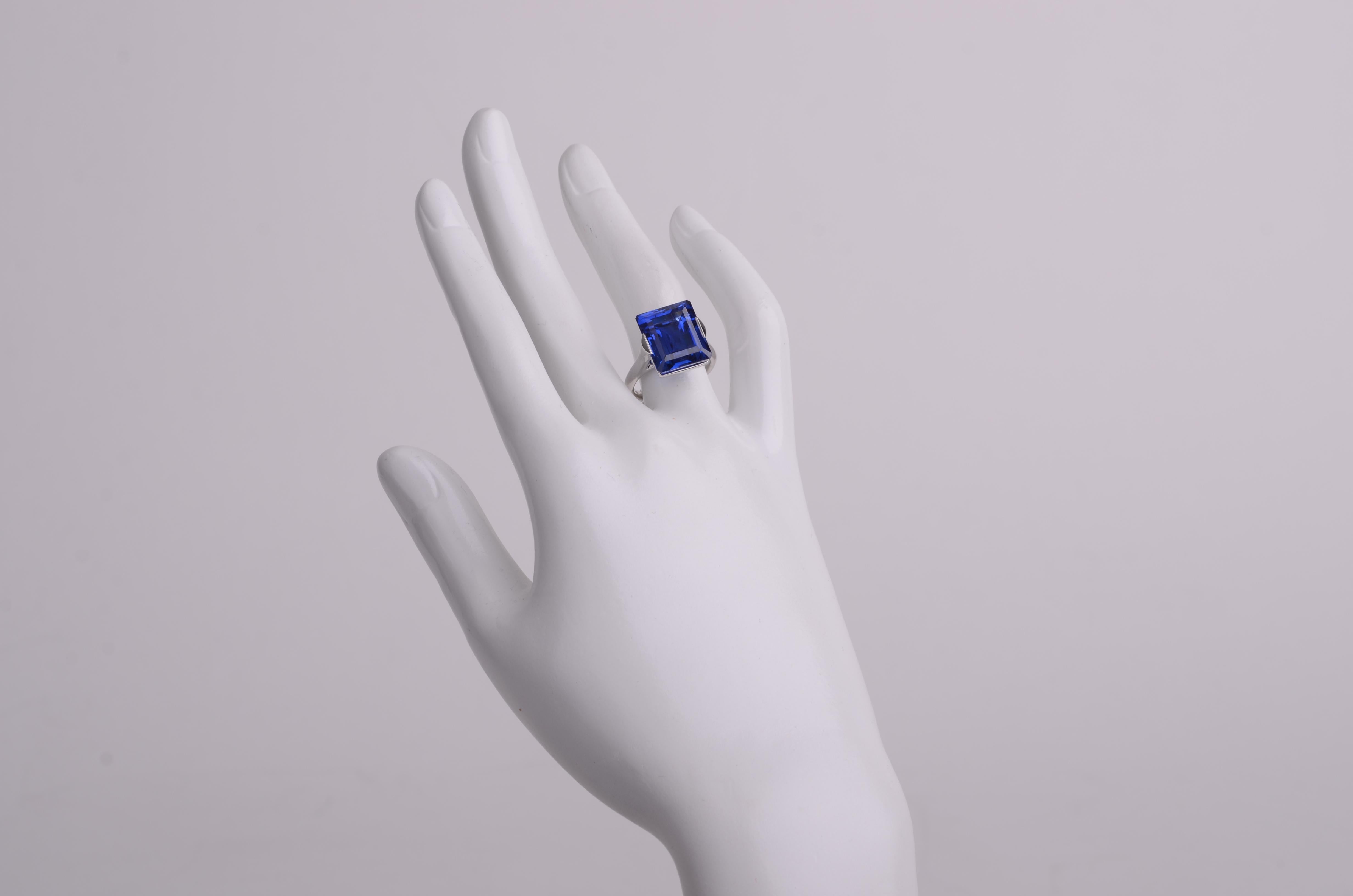 Emerald Cut 15.99 Carat Ceylon Sapphire Solitaire Ring For Sale