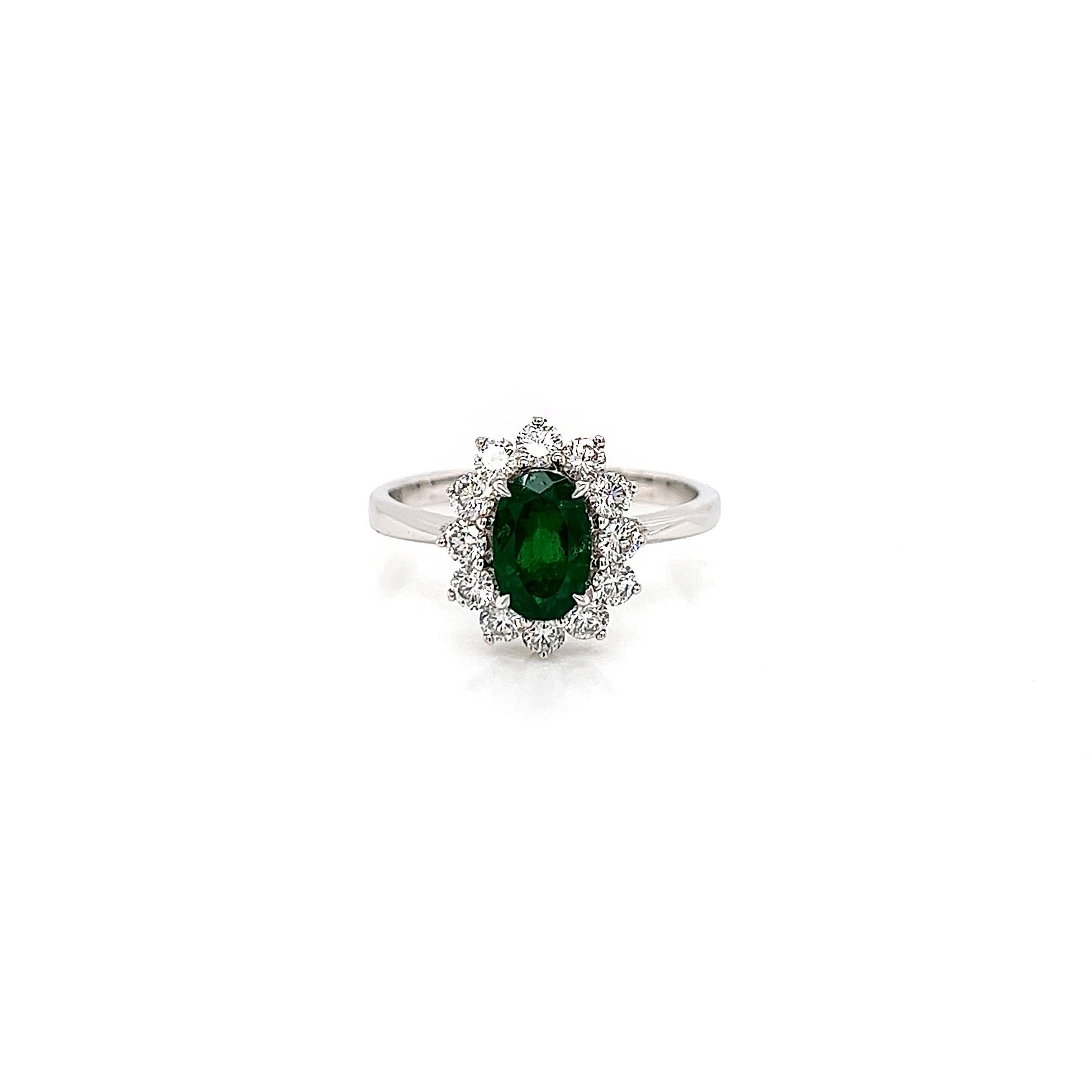 1.59 Carat Green Emerald and Diamond Ladies Ring

-Metal Type: 18K White Gold
-0.95 Carat Oval Cut Columbian Green Emerald
-0.64 Carat Round Natural Diamonds, F-G Color, VS-SI Clarity
-Size 7.0

Made in New York City