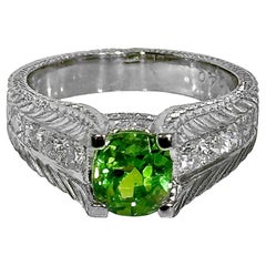 1.59Ct Cushion Cut Demantoid Garnet in an Engraved Platinum and Diamond Mounting