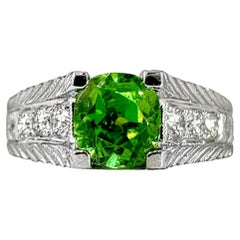 1.59Ct Cushion Cut Demantoid Garnet in an Engraved Platinum and Diamond Mounting