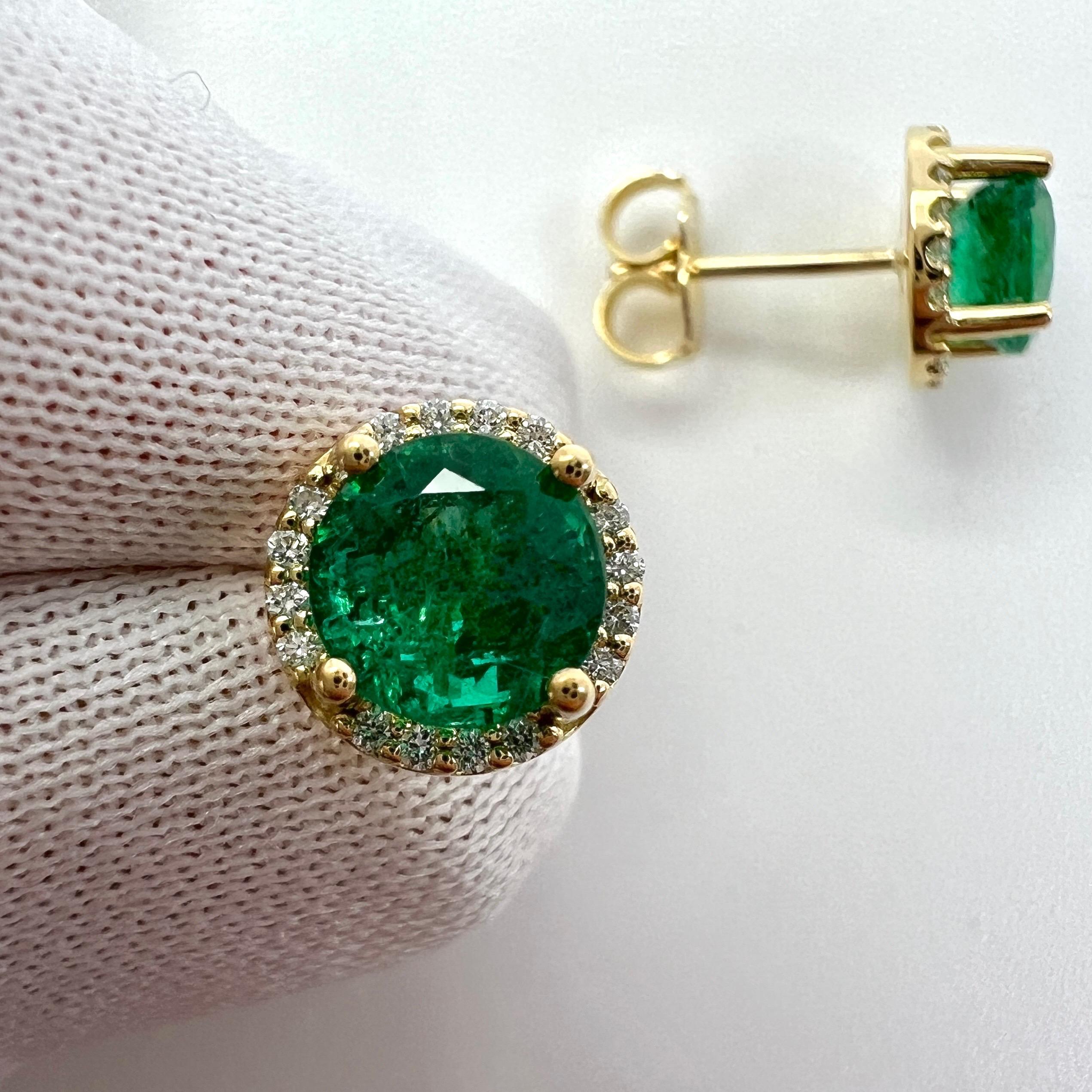 Vivid Green Round Cut Emerald And Diamond 18k Yellow Gold Halo Earring Studs.

These earrings feature two natural emeralds with a vivid green colour and an excellent round cut measuring 6mm. 1.59 total carat of emeralds.

These emeralds are a