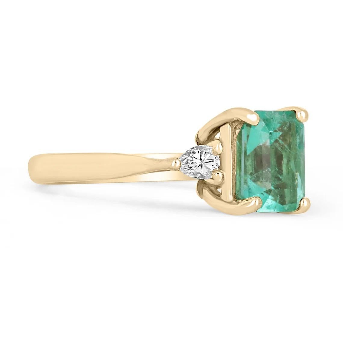 A classic Colombian emerald and diamond engagement, statement, or right-hand ring. Dexterously crafted in gleaming 14K gold this ring features a natural Colombian emerald-emerald cut from the famous Muzo mines. Set in a secure prong setting, this