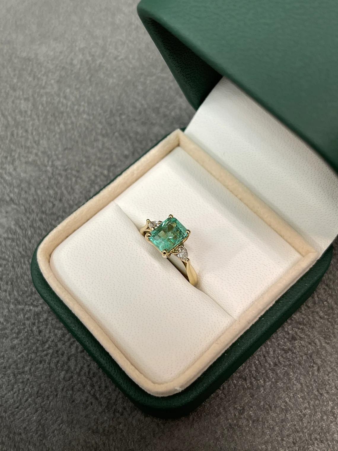 Women's 1.59tcw 14K Colombian Emerald-Emerald Cut & Pear Cut Diamond Three Stone Ring For Sale