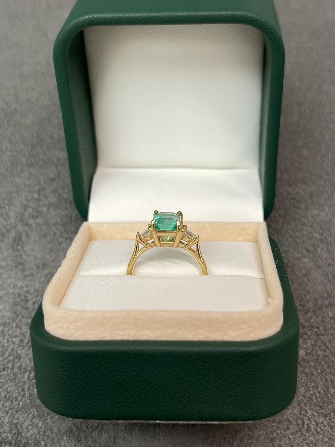 1.59tcw 14K Colombian Emerald-Emerald Cut & Pear Cut Diamond Three Stone Ring For Sale 1