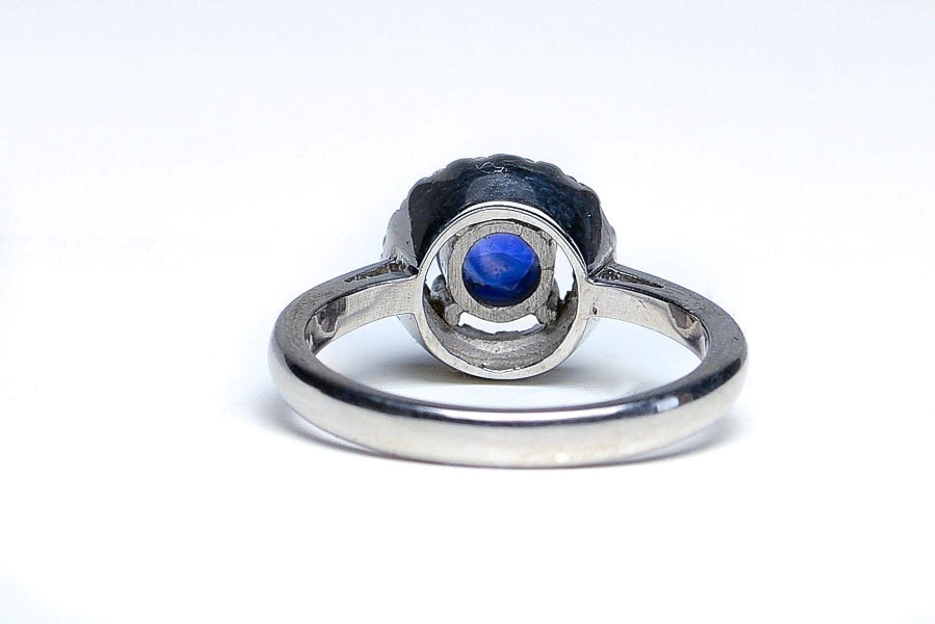 Artisan 1.5ct Blue Sapphire Floating Halo Engagement Ring For Sale
