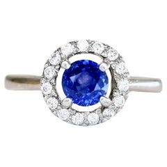 Verlobungsring mit 1,5 Karat blauem Saphir und schwebendem Halo