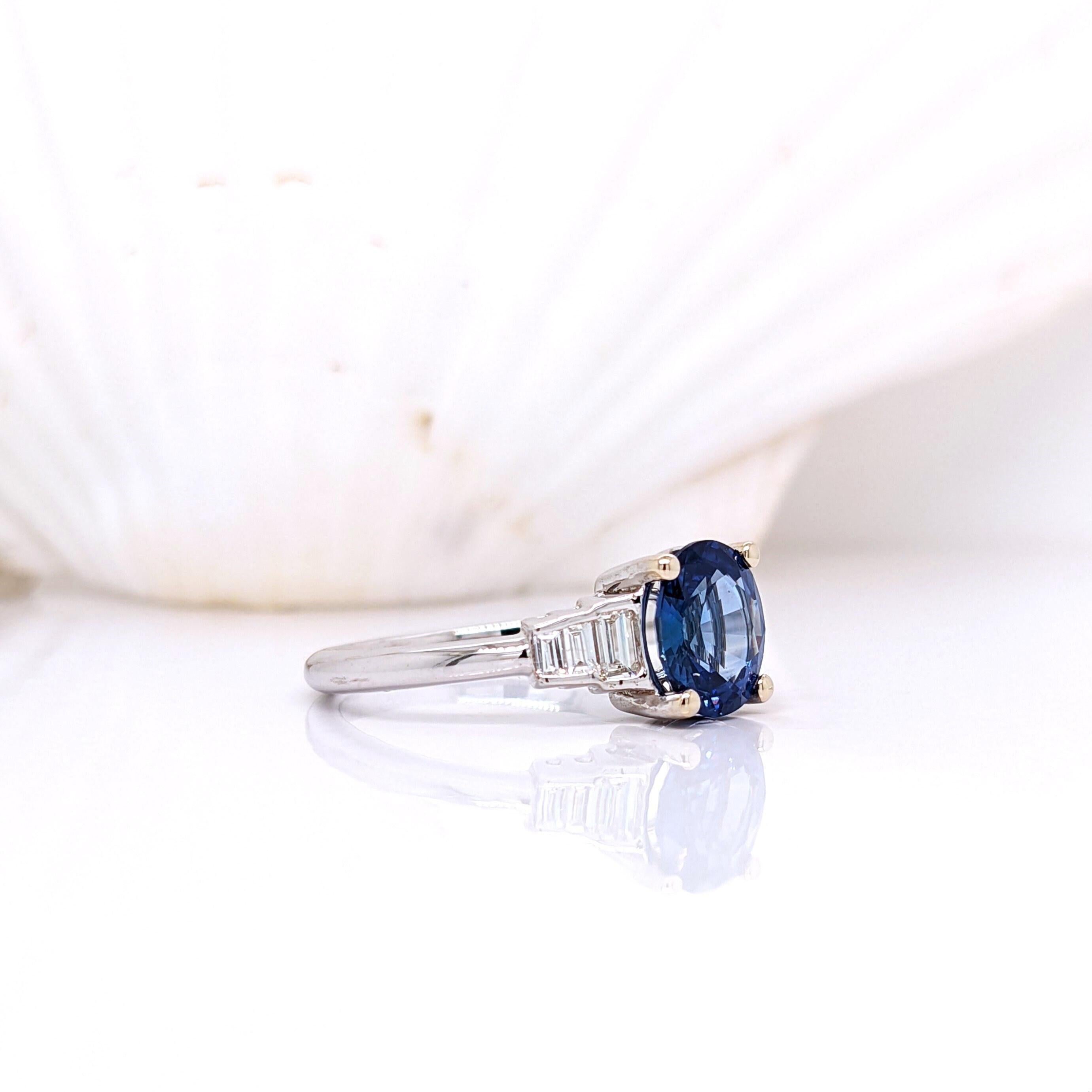 A beautiful oval cut blue sapphire that's heated to bring out a rich and pretty blue color! Perfectly accented by bezel set baguette diamonds and 14k white gold. 

Specifications

Item Type: Ring
Center Stone: Sapphire
Treatment:
