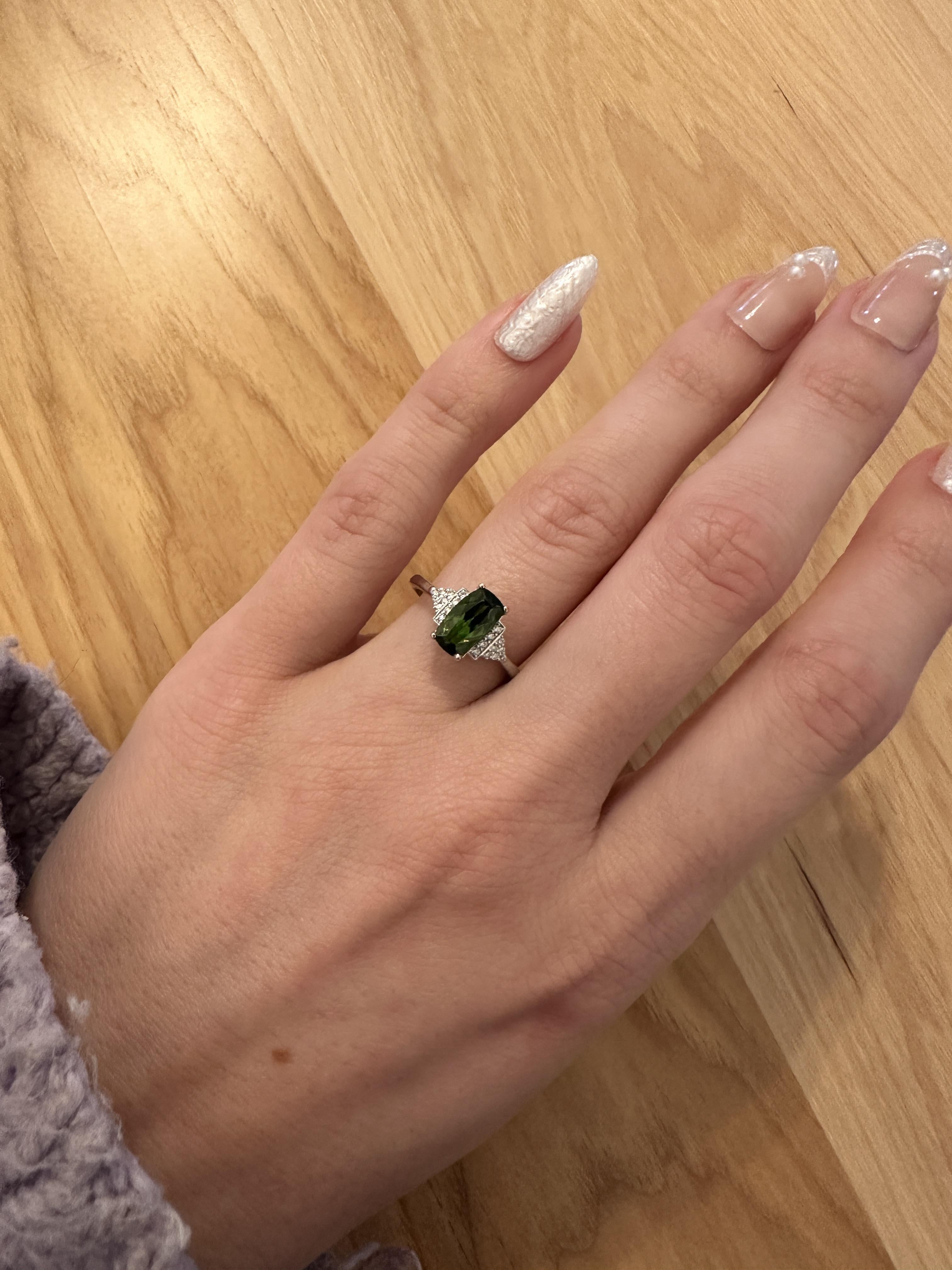This beautiful ring features a 1.50 carat Chrome Tourmaline gemstone with natural earth mined diamonds set in solid 14K white gold. This Chrome Tourmaline ring makes a lovely October birthstone gift for your loved ones!

**We offer complimentary