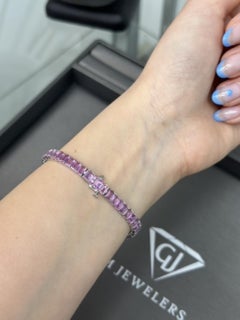 Pulsera de tenis de zafiro rosa talla esmeralda de 15 quilates y oro blanco de 14k