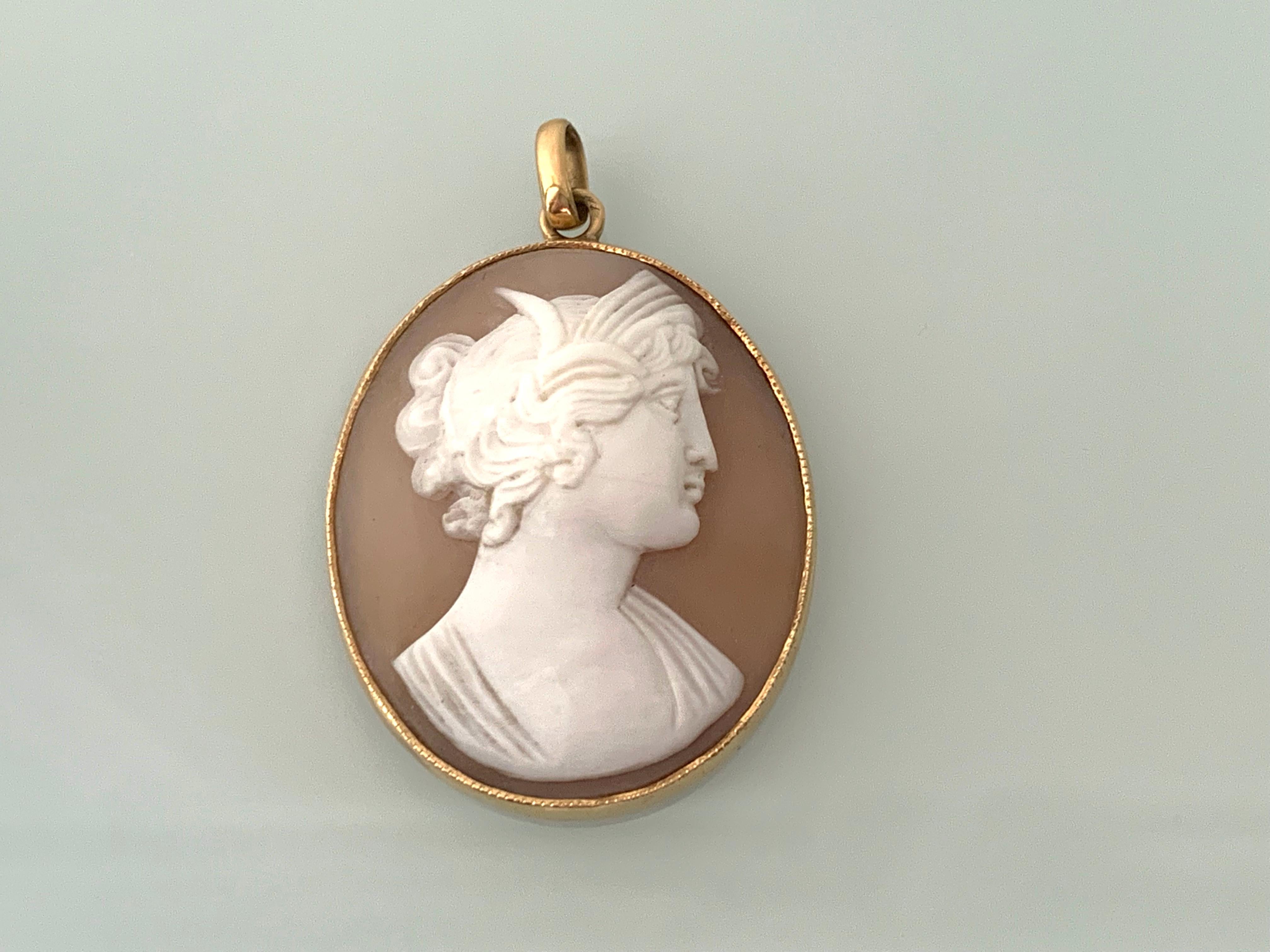 15ct Gold Antique Cameo Pendant
European Origin 
Late 19th Century
Marked heavily on the bail 
Beautifully hand carved womens face