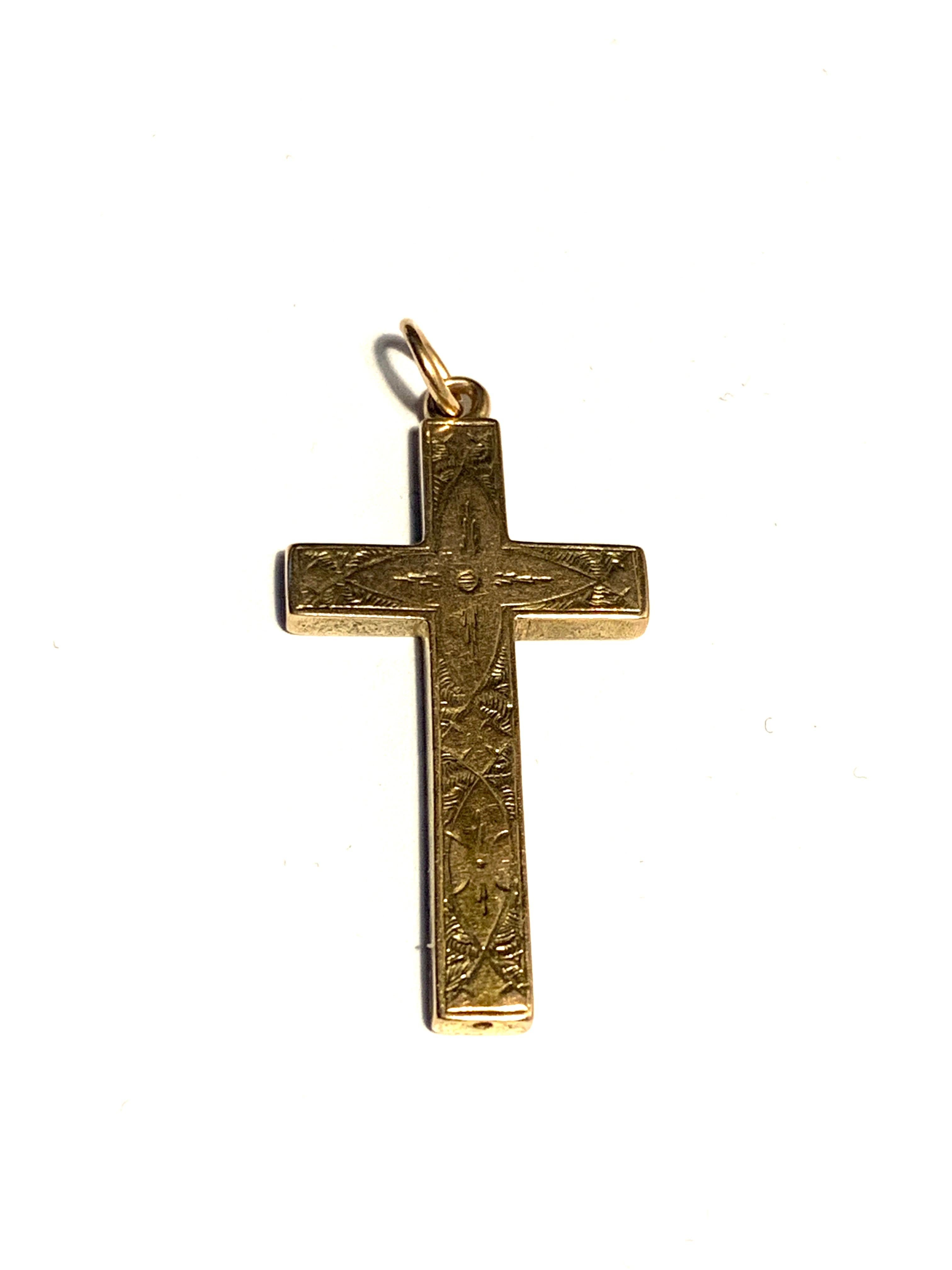 15ct Gold Antique Cross
with hand engraved foliage style design decoration
Circa 1845 - mid Victorian period
Size      3.5 cm x 2 cm
Weight  1.86 grams