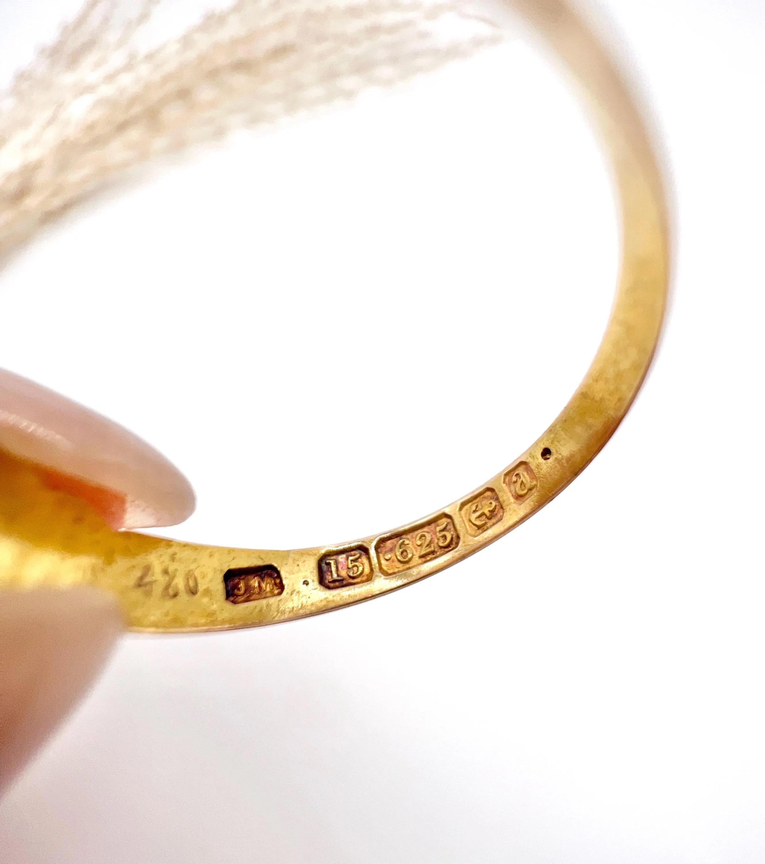 Antique % stone Ring 

15ct Yellow Gold

Hallmarked Birmingham 1900

Makers Mark J M 

Introducing a stunning 15ct gold Edwardian 5-stone ring, adorned with alternating natural rubies and diamonds in a scroll design setting. The ring boasts a full