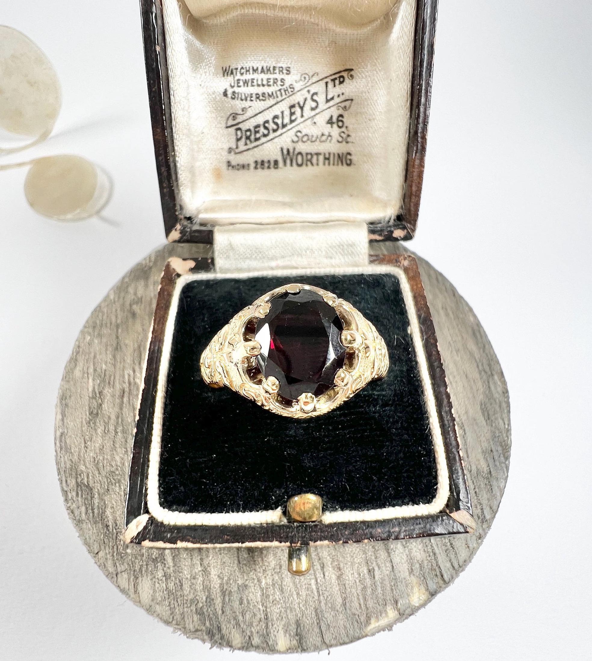 Antique Garnet Ring 

15ct Gold Stamped

Hallmarked Birmingham 1890

Makers Mark E V 

Introducing a stunning 15ct yellow gold Victorian ring with a fancy signet-style design. This elegant piece features a fabulous oval-shaped faceted garnet,