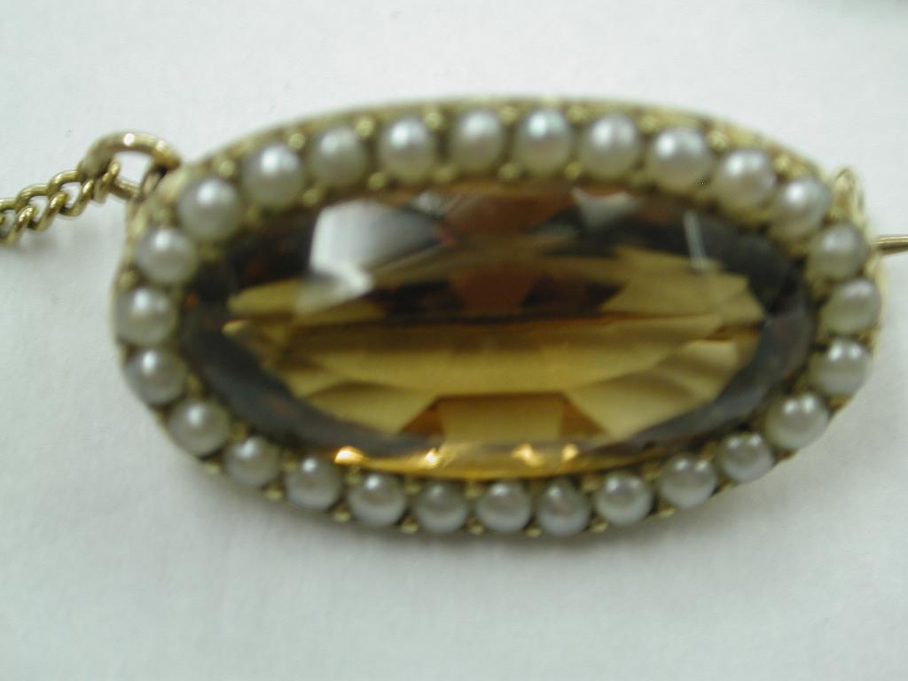 Early Victorian 15 Carat Gold Topaz and Seed Pearl Brooch Date circa 1850 For Sale