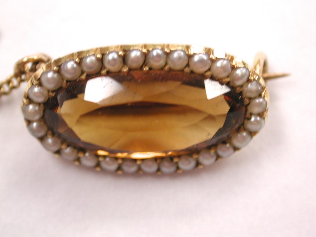 Oval Cut 15 Carat Gold Topaz and Seed Pearl Brooch Date circa 1850 For Sale
