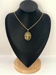 15ct Gold Victorian Locket with Seed Pearl Cross and Black Enamel Circa 1880