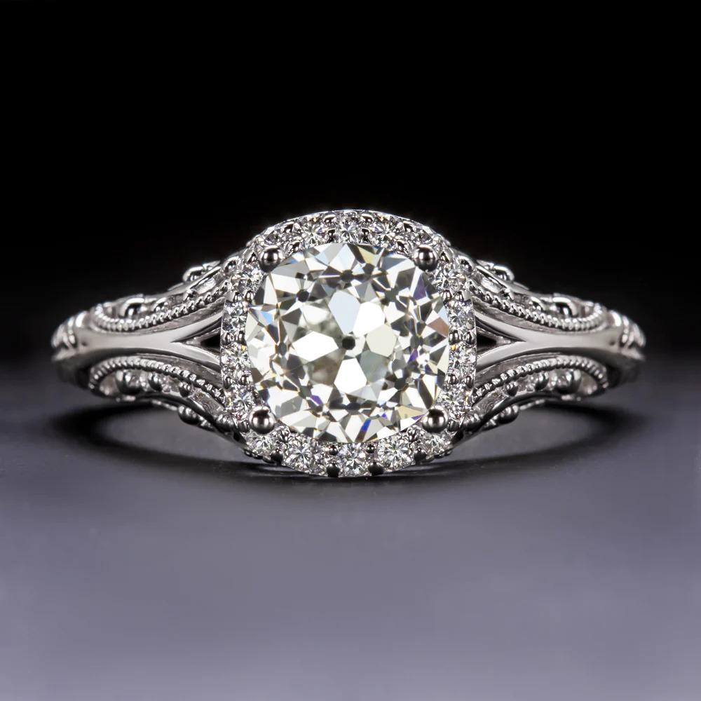 Modern 1.5ct Old European Cut Diamond Richly Accented by a Romantic Ring For Sale