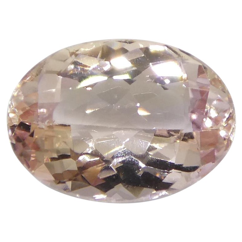 1,5 Karat ovaler orange-rosa kaiserlicher Topas GIA zertifiziert